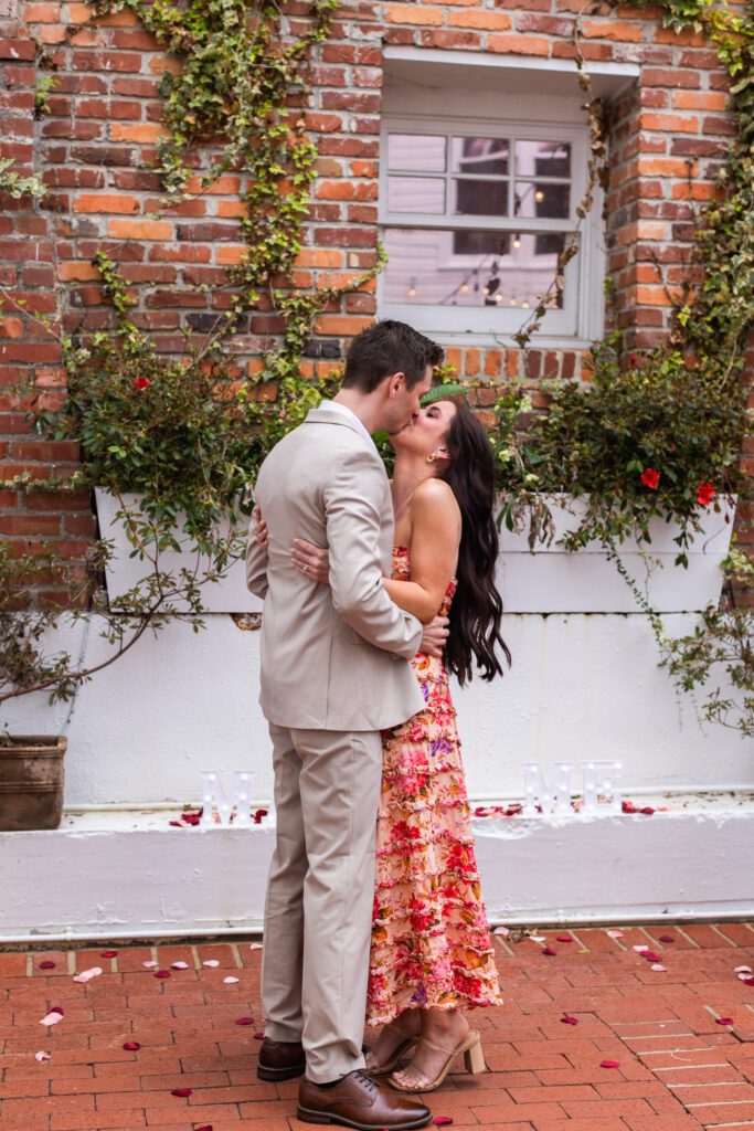 Couple hugging right after the proposal at The Partridge Inn